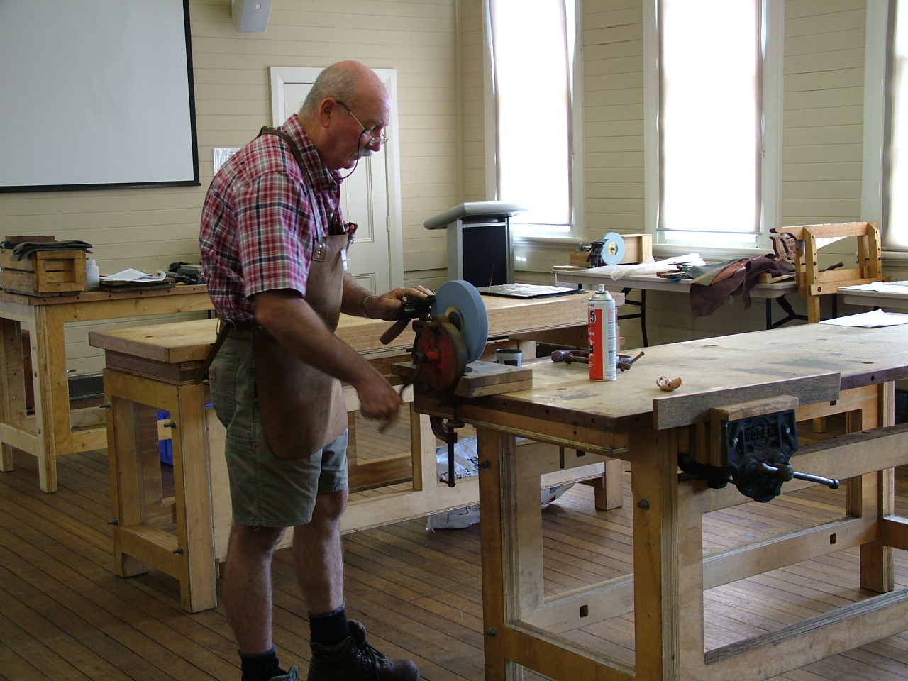 Jim Davey demonstrating hand grinding